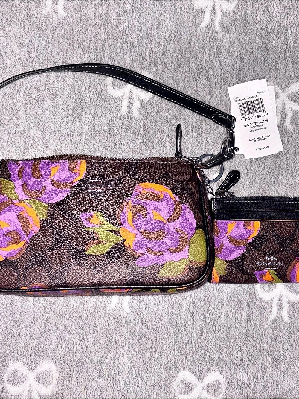 Nolita 19 In Signature Canvas With Rose Print with matching card case. EUC
